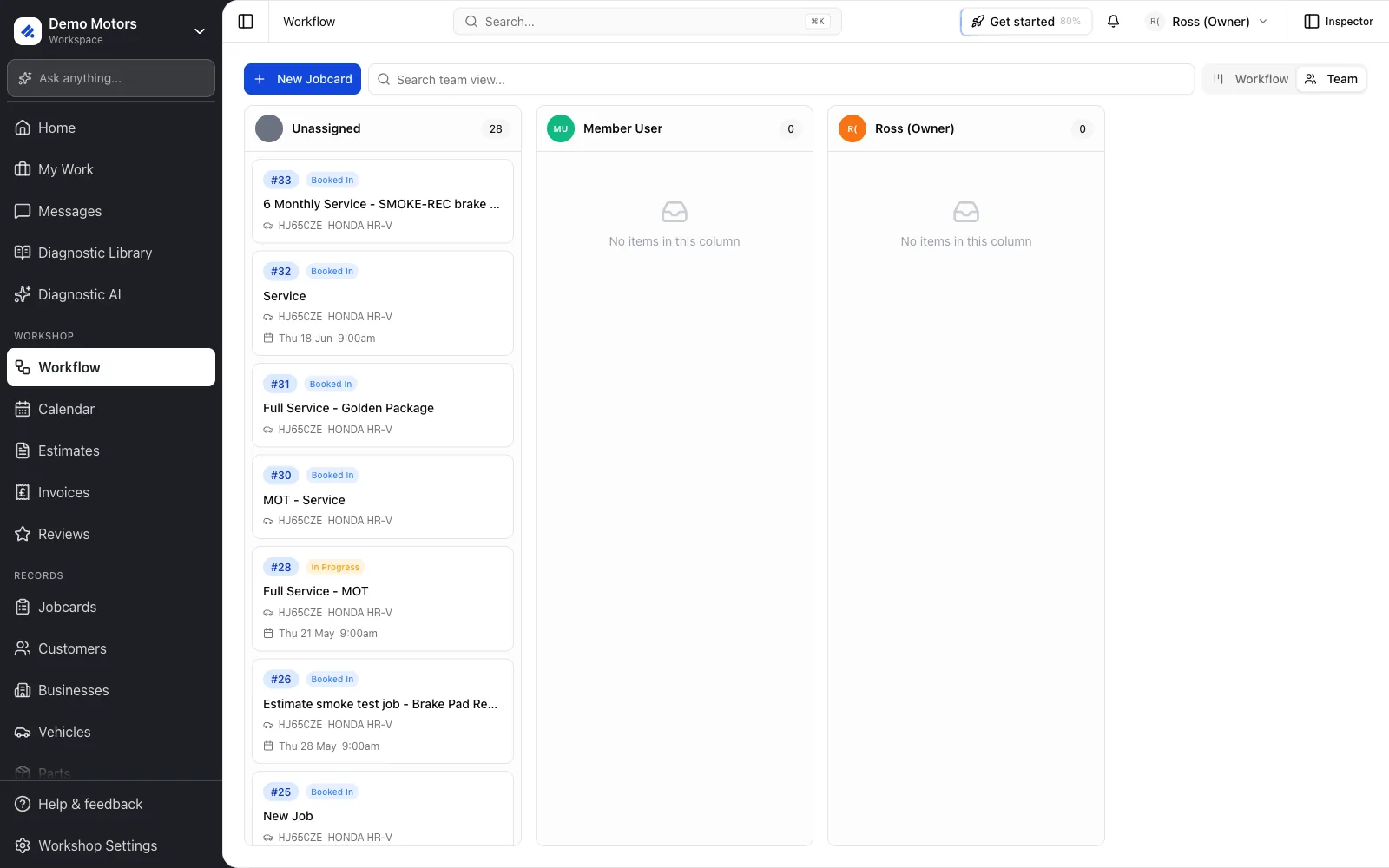 Team view: one column per team member plus Unassigned. Drag a card to reassign it.